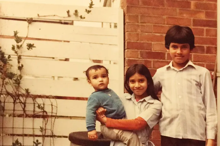 A family photograph of three children from Sabbir Karim's childhood