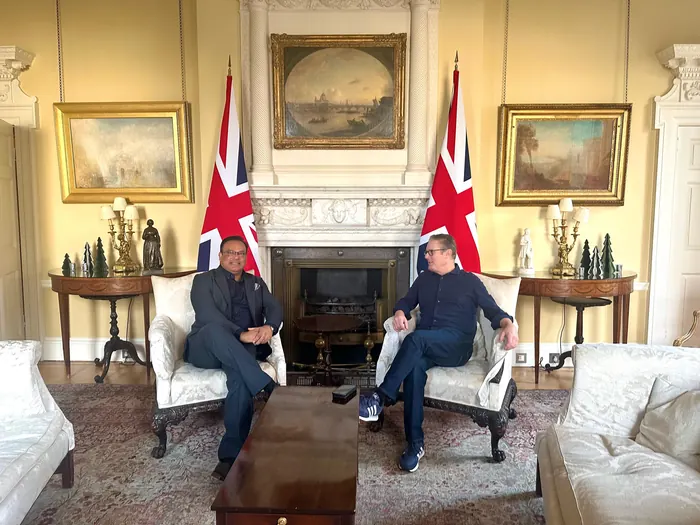 Sabbir Karim seated in a state room at 10 Downing Street